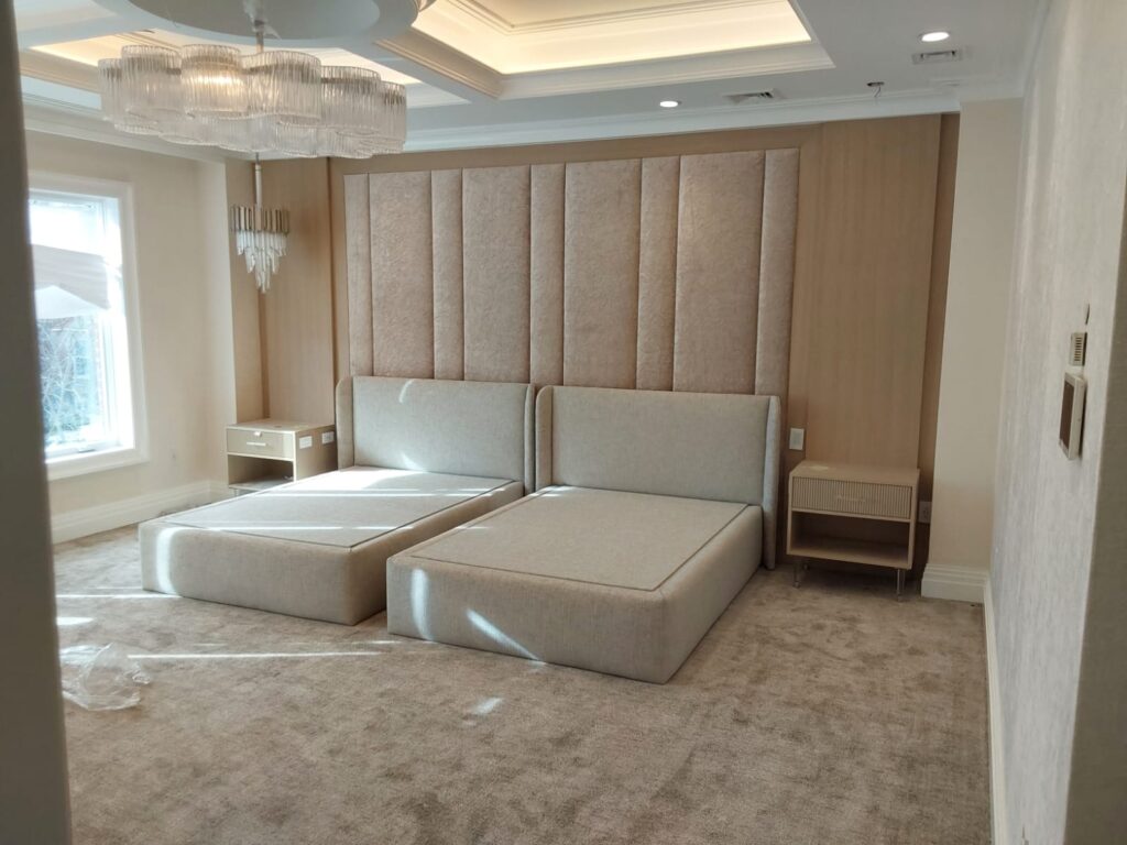 Fabric acoustic wall panels with subtle wood trim detailing