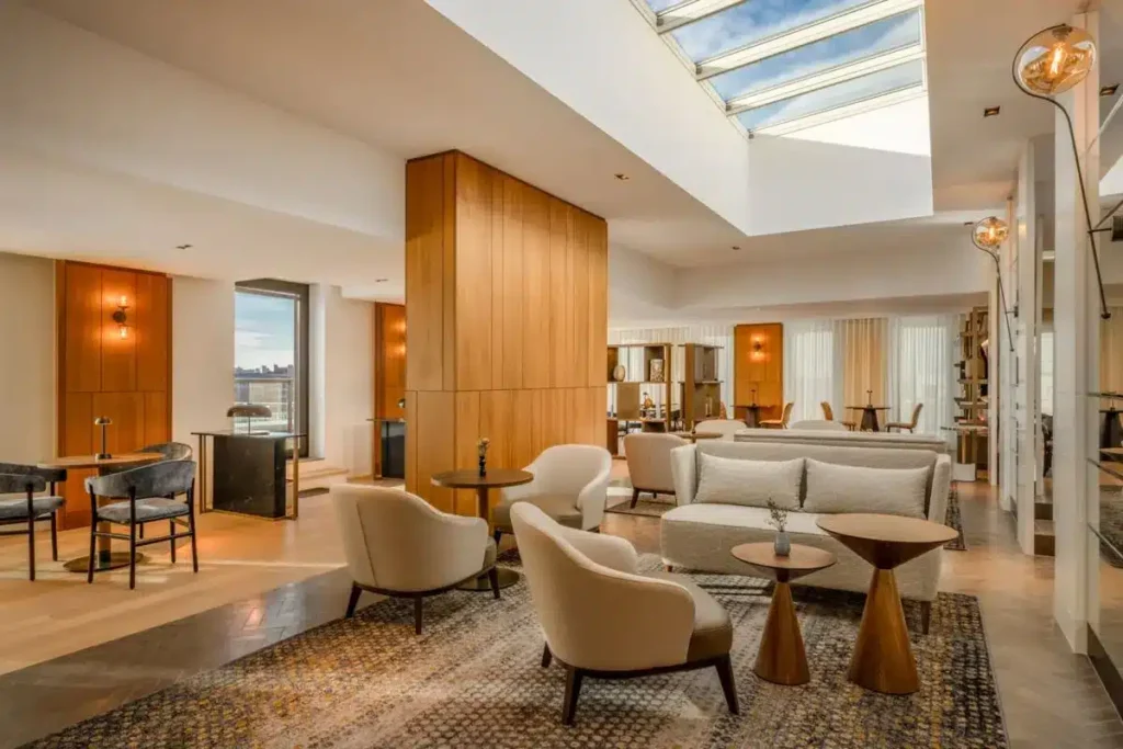 Custom upholstered seating in a modern hotel lobby, showing the finished hospitality interior.