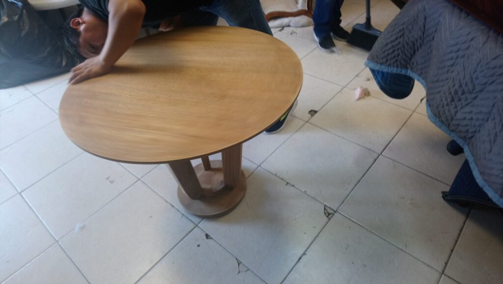 Barbara Barry for Baker end table stripped down in the workshop before refinishing.