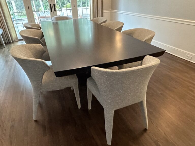 Baker dining table and chairs with new upholstery and refinishing after delivery