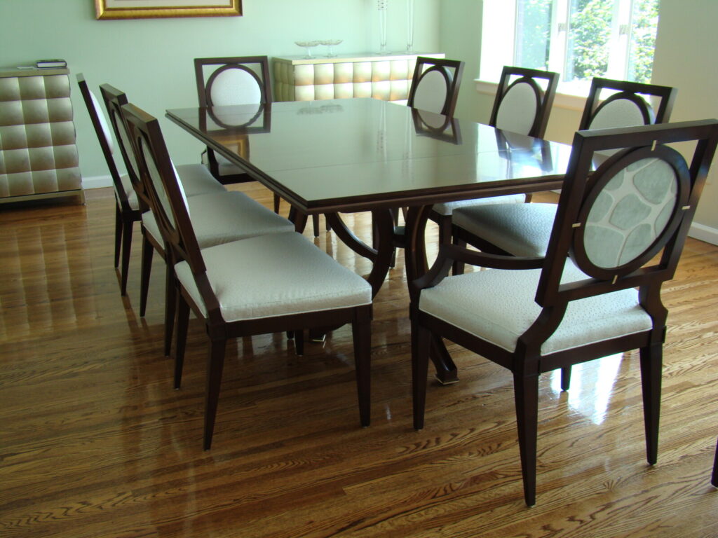 Baker dining table and chairs with new upholstery and refinishing after delivery