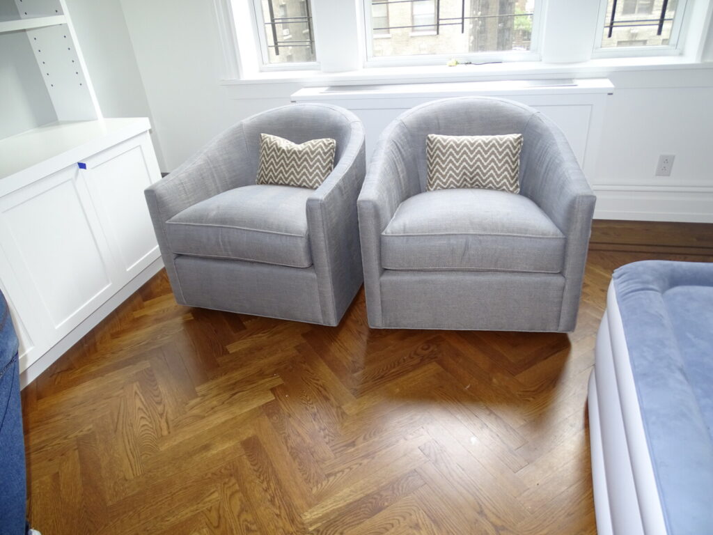 Luxury Baker furniture restoration showcasing master-level wood refinishing and bespoke upholstery for high-value classic collections.