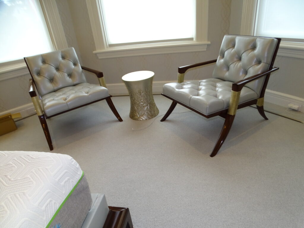 Baker Thomas Pheasant Athens lounge chairs in leather, shown as a pair after delivery.