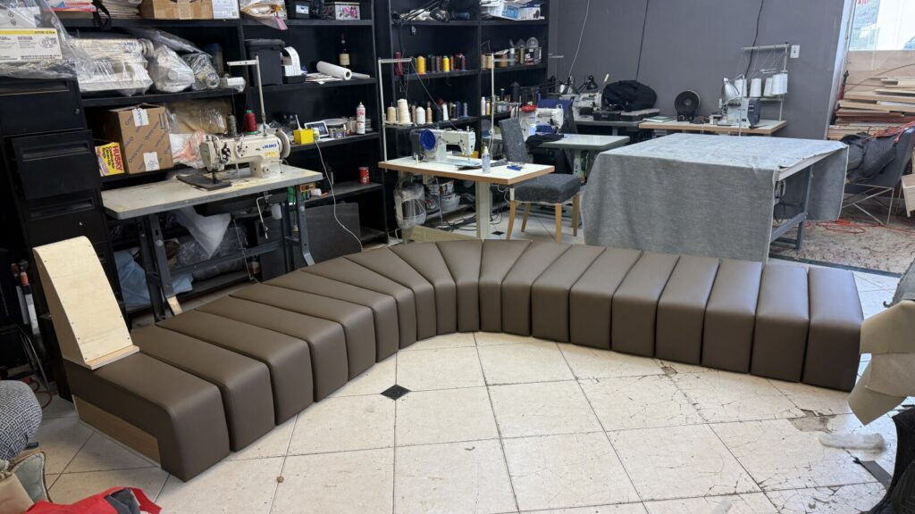 Channel-back banquette with vertical seat in shop