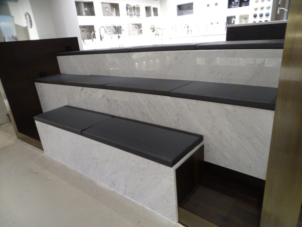 Installed banquette with plain back and tight seat in a commercial lounge