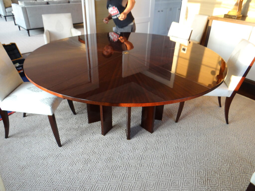 Baker radial expanding dining table with leaf alignment service and restored mechanism.