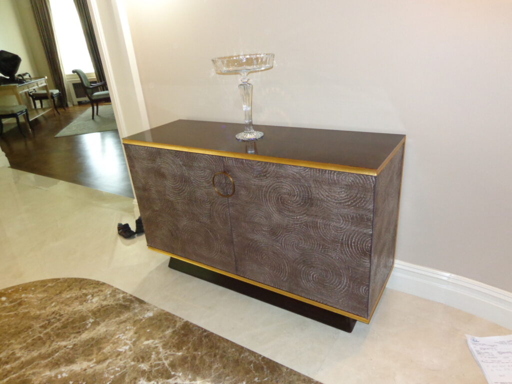 Baker Bill Sofield Kiosk cabinet with bronze textured panels restored with detailed refinishing.