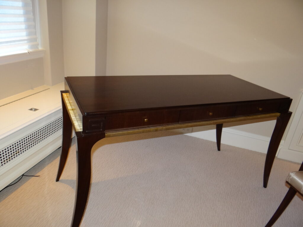 Baker Thomas Pheasant Diana dressing table receiving final detailing during restoration.