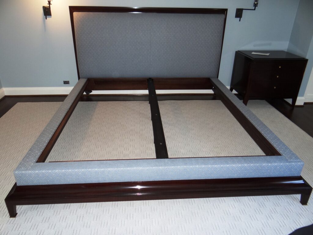 Baker Thomas Pheasant Moderne king bed with restored tufted upholstery.