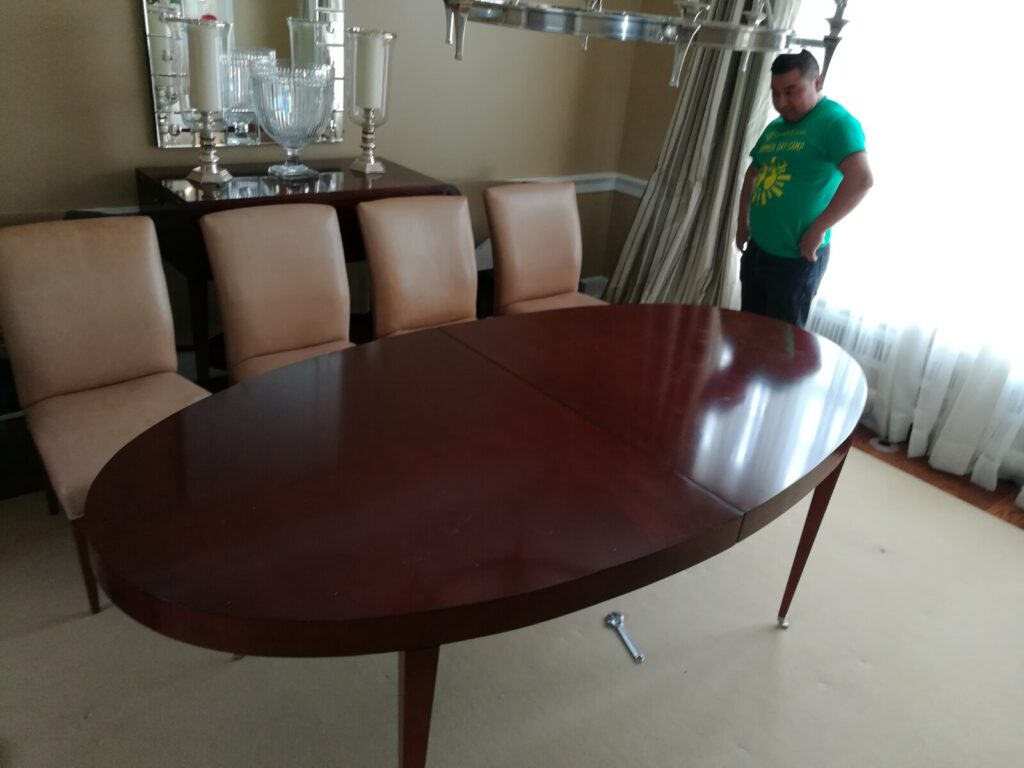 Refinished Barbara Barry for Baker oval dining table photographed in the client’s home after delivery.