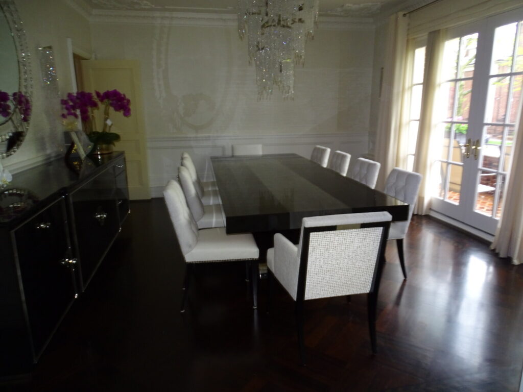 Restored Baker Thomas Pheasant Atelier side chair with correct fabric installed, shown in the client’s Brooklyn dining room after delivery.
