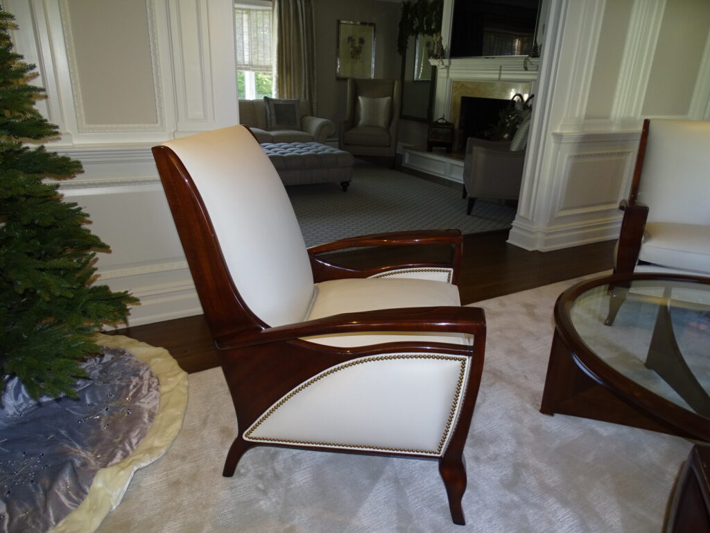 Refinished and reupholstered Hancock & Moore lounge chairs photographed in the client’s home after delivery.