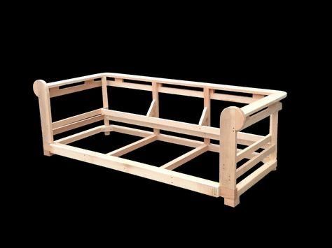 Wooden sofa frame under construction with a rectangular base, rounded arm supports, and vertical slats for the back.