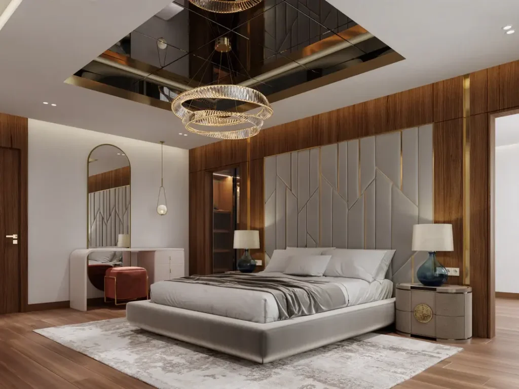 A refined modern bedroom with a custom upholstered geometric headboard and gold accents, reflecting the craftsmanship we bring to every home we serve.