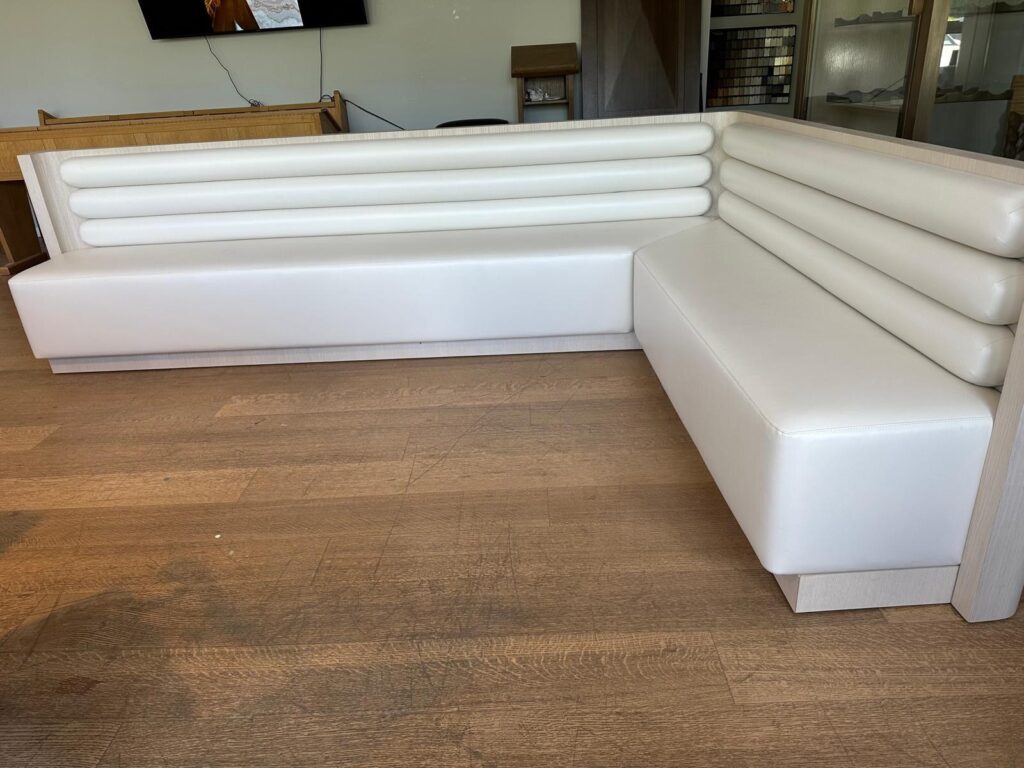 L-shaped banquette frame with corner joint bracing after finished in shop