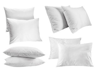 Weather‑resistant outdoor pillows arranged together on a clean surface.