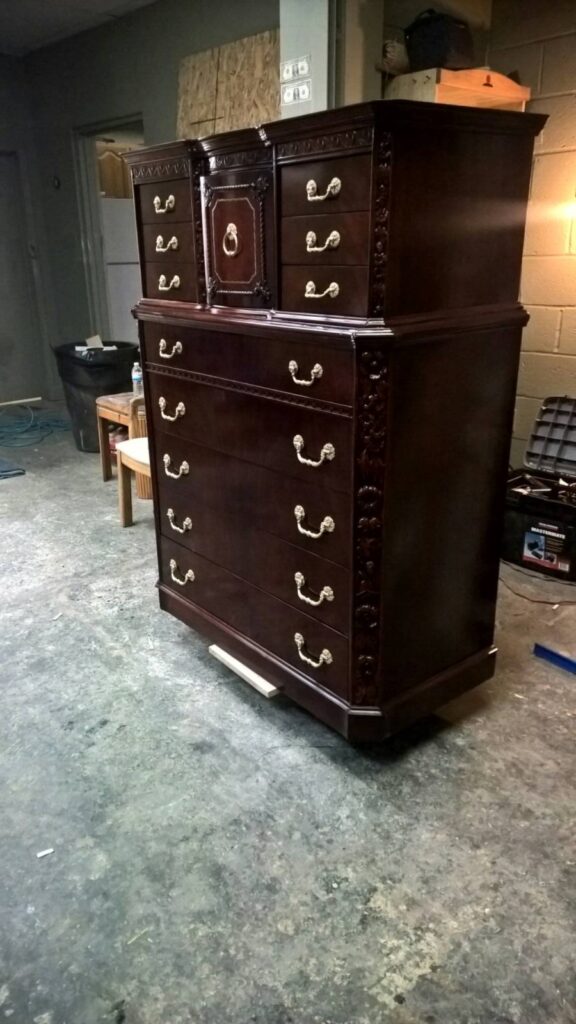 Vintage Baker tall chest fully refinished in the workshop with a restored, even wood finish.