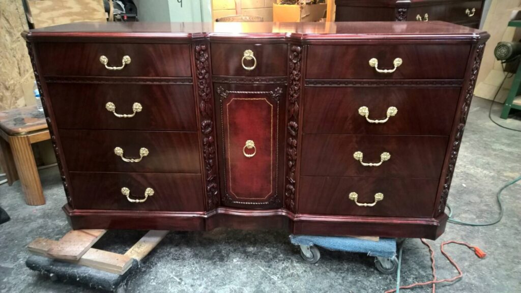 Vintage Baker long dresser fully refinished in the workshop with a restored, uniform wood surface.