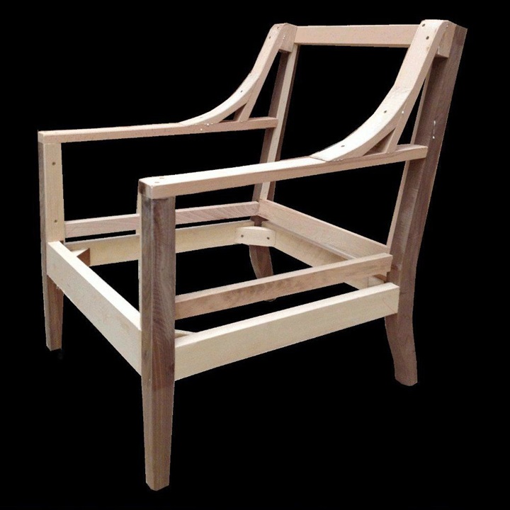Unfinished wooden chair frame with visible joints, screws, and support structure for the seat, back, and arms.