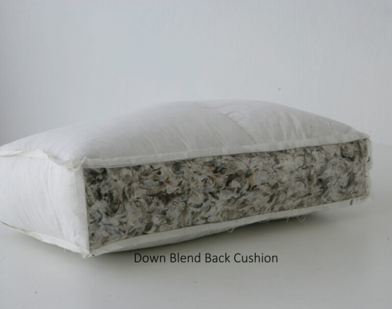 White rectangular cushion displayed with a cutaway section showing a loose down‑blend filling inside, set against a plain background.