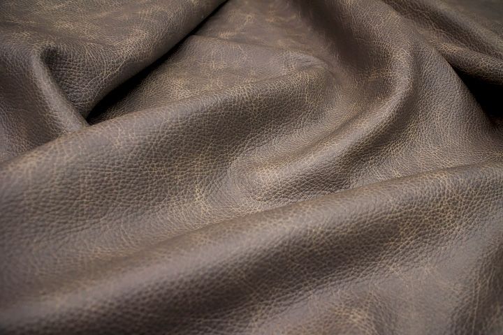 Leather patina showing natural darkening and aging over time