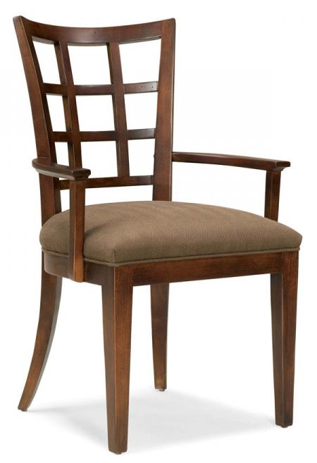 Dining chair seat being reupholstered with new padding and fabric