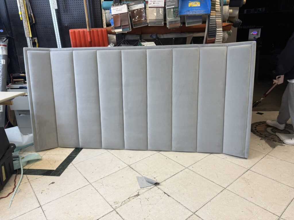 Headboard components staged for upholstery