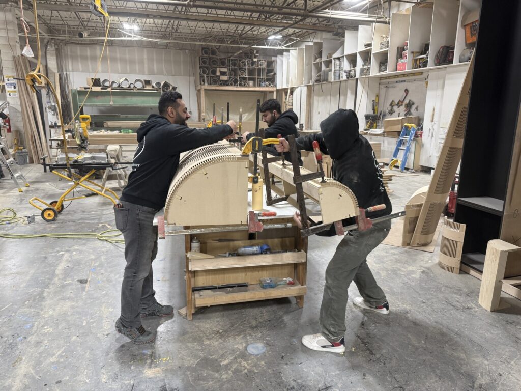 Builtin banquette installation anchored to wal