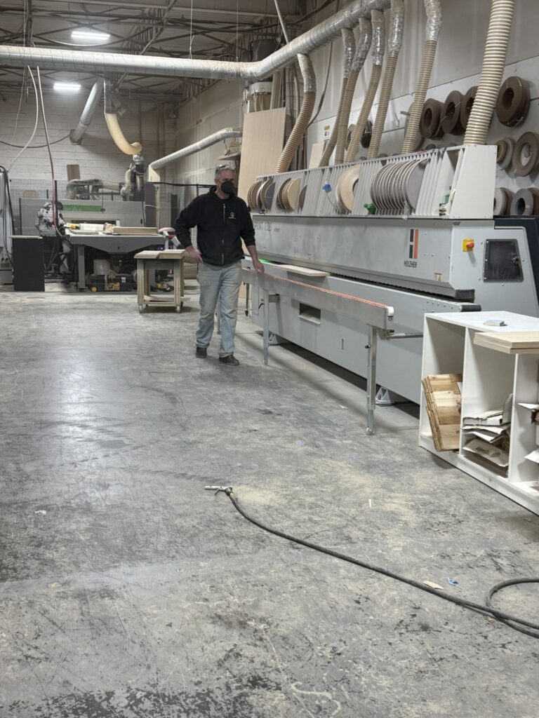 Cnc operator cutting headboard components in west nyack facility