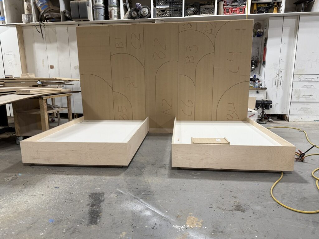 Geometric headboard panels routed with millimeter accuracy.
