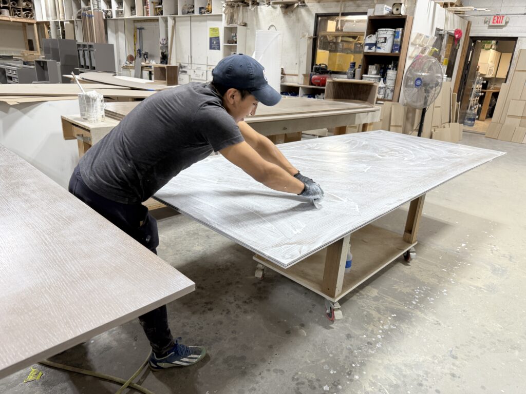 Cnccut geometric wall panel substrates staged for assembly